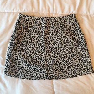 Leopard print skirt.